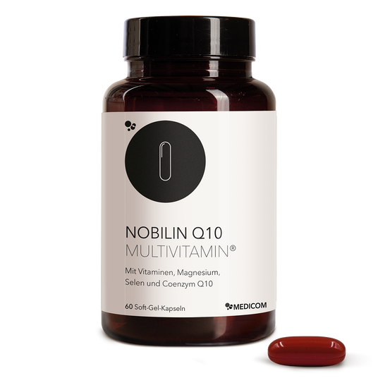 A bottle of Nobilin Q10 Multivitamin® Gratis with one red capsule next to it on a white background.