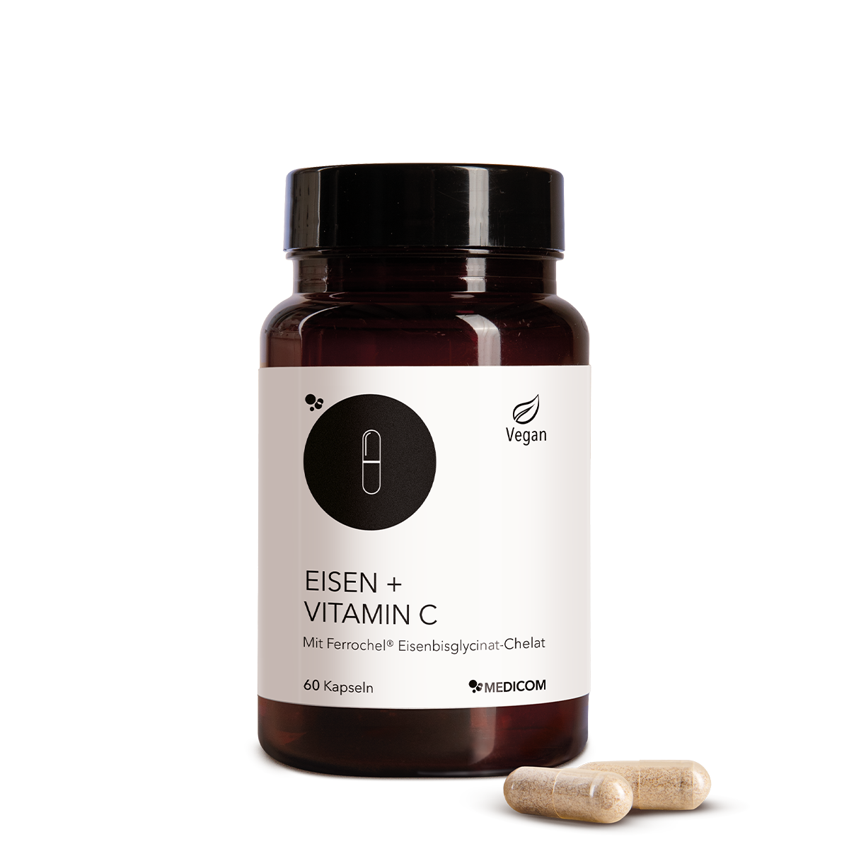 Die Produktdose von Eisen + Vitamin C und zwei Kapseln im Vordergrund