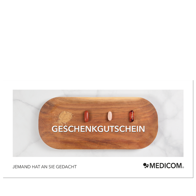 Ein Holztablett mit verschiedenen Kapseln