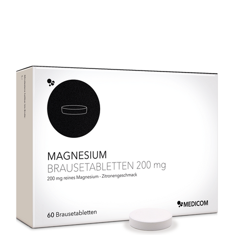 Die Produktverpackung von Magnesium Brausetabletten 200 mg von Medicom mit einer Brausetablette im Vordergrund