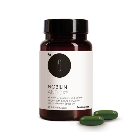 Die Produktdose von Nobilin Antiox® mit zwei grünen Soft-Gel-Kapseln im Vordergrund