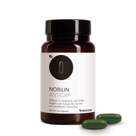 Die Produktdose von Nobilin Antiox® mit zwei grünen Soft-Gel-Kapseln im Vordergrund