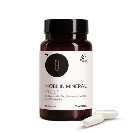Die Produktdose von Nobilin Mineral Plus® mit zwei Kapseln im Vordergrund