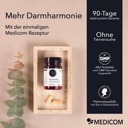 Die Produktdose von ProBalance mit der Abbildung des Produktes auf einem Marmortablett mit 2 Kapseln. Rechts im Bild die Siegel und Qualitätszertifikate von Medicom