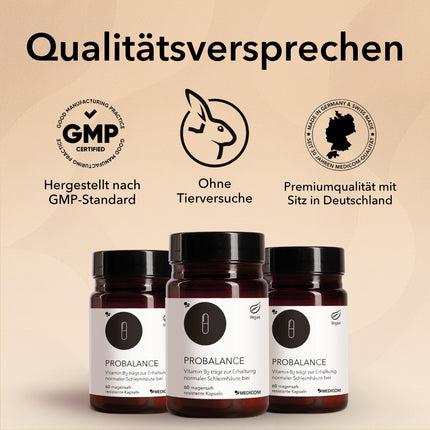 Die Produktdose von ProBalance mit der Abbildung des Produktes auf einem Marmortablett mit 2 Kapseln. Rechts im Bild die Siegel und Qualitätszertifikate von Medicom