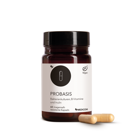 Die Produktdose von ProBasis von Medicom mit zwei Kapseln im Vordergrund.