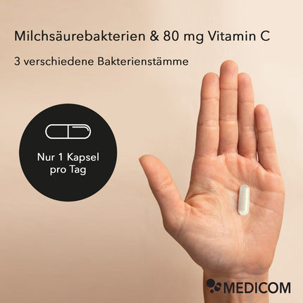 ine Frauenhand hält eine Kapsel in der Hand. Im Text stehen Produktinformationen wie Milchsäurebakterien & 80 mg Vitamin C sowie die Verzehrempfehlung: Nur 1 Kapsel pro Tag