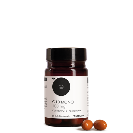 Die Produktdose von Q10 Mono 100 mg und zwei Soft-Gel-Kapseln im Vordergrund