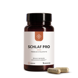 Median Schlaf Pro dark bottle with label and two capsules in front on a white background, formulated to promote faster sleep onset (schnelleres Einschlafen) and enhance sleep quality (Schlafqualität).