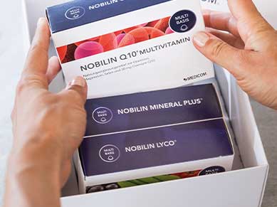 Medicom-Produkte wie Nobilin Q10® Multivitamin in einer weißen Box