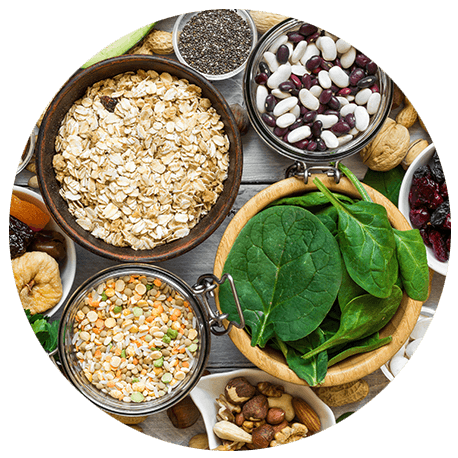 Magnesium in Lebensmitteln wie Spinat, Getreideflocken und Nahrungsergänzungsmitteln von Medicom